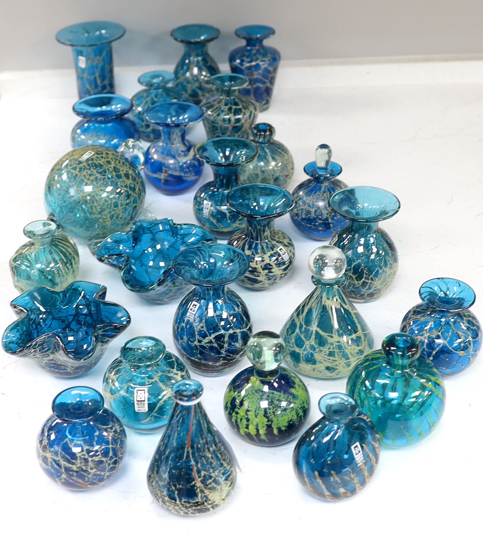 A collection of twenty five Mdina glass vases, bottles and ornaments, sea and sand colour